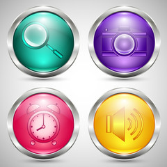 Set of colored glass buttons in metal frame with communication icons on grey background