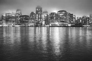 Manhattan at a foggy night, New York City, USA
