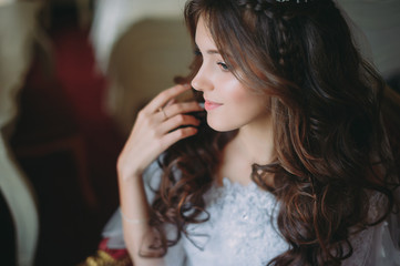 beautiful bride posing in hotel. wedding in the style of fine art