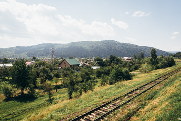 Fototapeta na wymiar View of the mountains from the train car