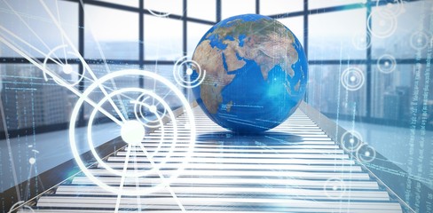 Composite image of blue globe on conveyor belt