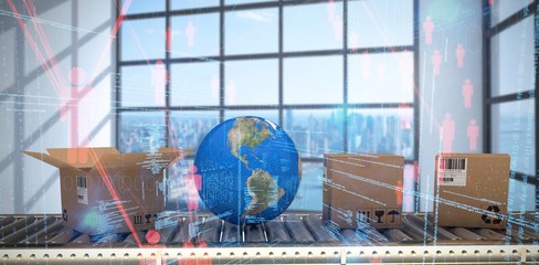 Composite image of globe amidst brown cardboard boxes on 3d