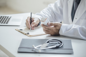 Doctor Writing Prescription