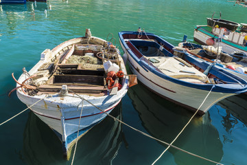 Fototapeta na wymiar Fishing port with old wooden fishing boats in Sicily, Italy