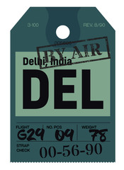Delhi airport luggage tag. Realistic looking tag with stamp and information written by hand. Design element for creative professionals.
