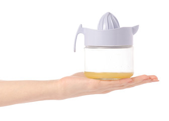 Juicer lemon juice in hands