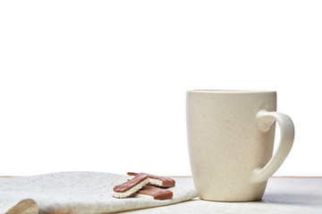 Close-up white cup of coffee with chocolate on white background, top view