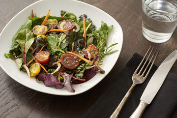 fresh salad on brown table