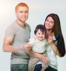 Fototapeta na wymiar happy smiling family isolated on white background