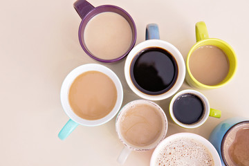 Obraz na płótnie Canvas Mugs with hot caffeinated drinks. Good morning concept