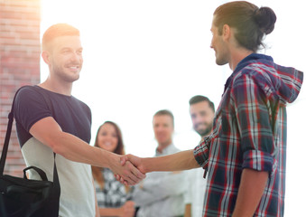 Obraz premium handshake staff of the Agency