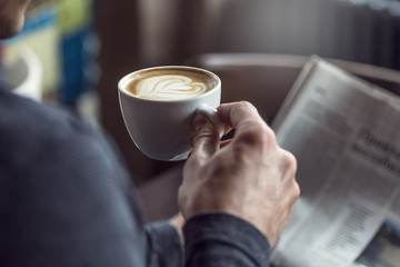 Drinking espresso