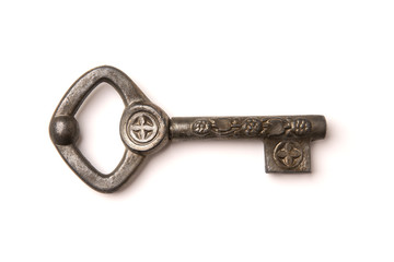 Vintage old key isolated on white background