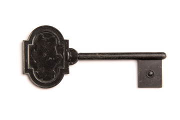 Antique key isolated on white background