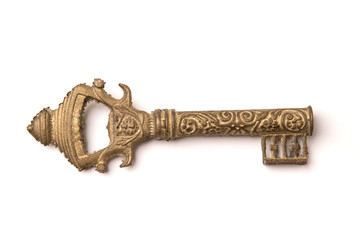 Vintage golden key isolated on white background
