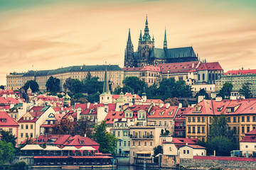 Obraz premium .Evening in Prague. View of the Prague Castle and the embankment of the Vltava River. Czech Republic. Toned.