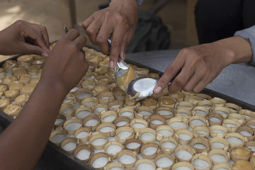 hands of sugar cane workers in Cambodia