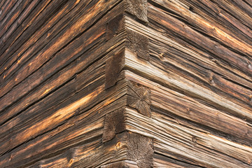 Fototapeta premium A corner of the wall of the old log house.