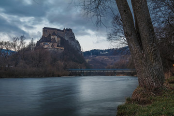 Evening view on Orava Castle - is situated on a high rock above Orava river in the village of Oravský Podzámok, Slovakia.