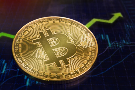 Macro shiny bitcoin and trading market data chart. virtual cryptocurrency concept