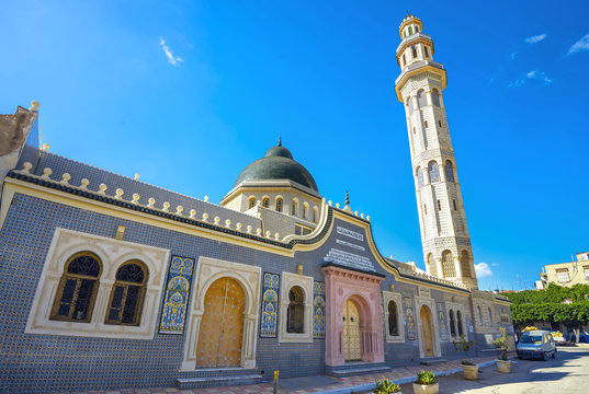 Minaret tower of mosque in old town Nabeul. Tunisia, North Africa
