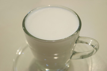Warm Buffalo Milk in Transparent Glass Cup 