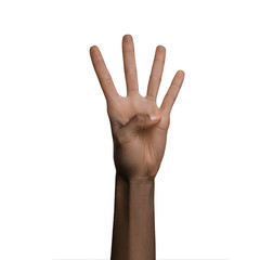 African american black hand showing four fingers gesture isolated on white background