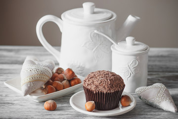 Teapot, cupcakes and different decorations