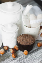 Teapot, cupcakes and different decorations