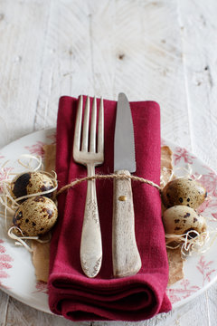 Easter table setting with quail eggs