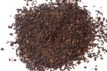 Beautiful and dry tea lies on a white background. Isolated