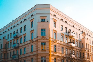 Fototapeta na wymiar orange corner building with clean sky at berlin