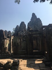 Angkor Wat in Siem Reap, Cambodia. Ancient ruins of Bayon Khmer stone temple in jungle forest.