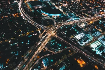 Foto op Plexiglas Aerial view of a massive highway in Los Angeles, CA at night © Tierney