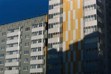 Fototapeta premium Apartment houses in sunny day. Natural