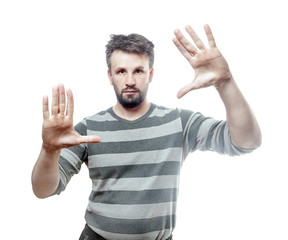 Magic trick. Photo portrait of a young european man showing both of his opened palm. Isolated on white background with clipping path.