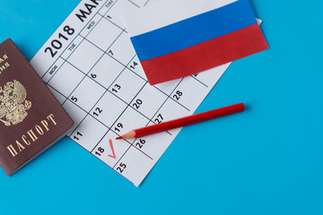 Presidential election in Russia 2018. Calendar, flag , passport and red pencil