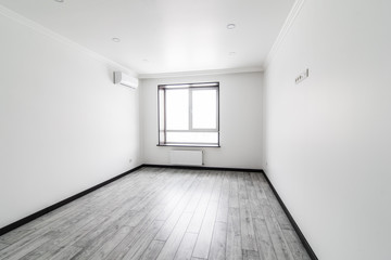 beautiful apartment, interior, big empty room with grey floor and bright window. New home. Rent hause. Sale appartment