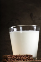 Chocolate chip cookie and one glass of milk