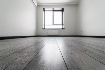 new apartment, empty room with hardwood floor. Buy new apparment. Sale or rent.