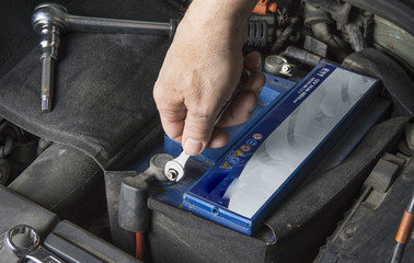 Car battery change. Check contact with wrench