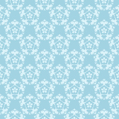White floral ornament on blue. Seamless pattern