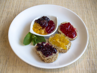 Breakfast with sweet of raspberries, kumquats and blackberries.