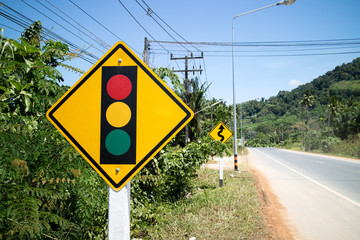 Traffic sign on a road bend