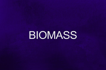 Biomass word written against ultra violet background