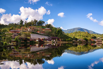 Fototapeta na wymiar beautiful lake and sky view of village and mountain reflection in meahongson northern of Thailand