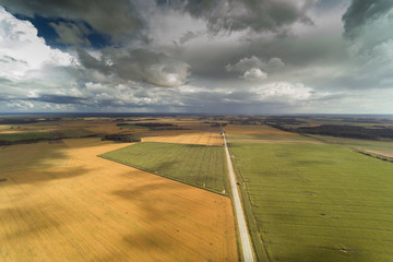 Dark clouds over land , Tukums area, Latvia.