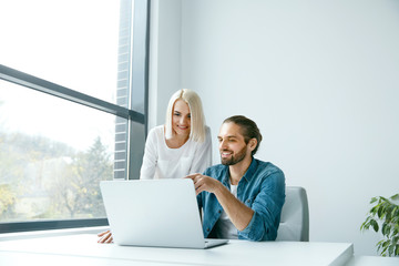 Business People In Office. Man And Woman Working, Sharing Idea.