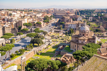Fototapeta na wymiar Aerial view of the Roman Forum and Colosseum in Rome, Italy