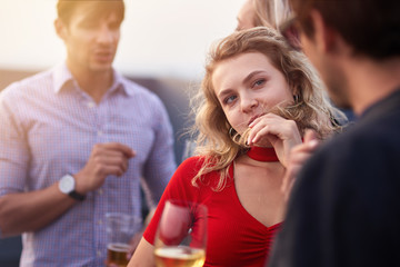 Pleasant friends resting at the party